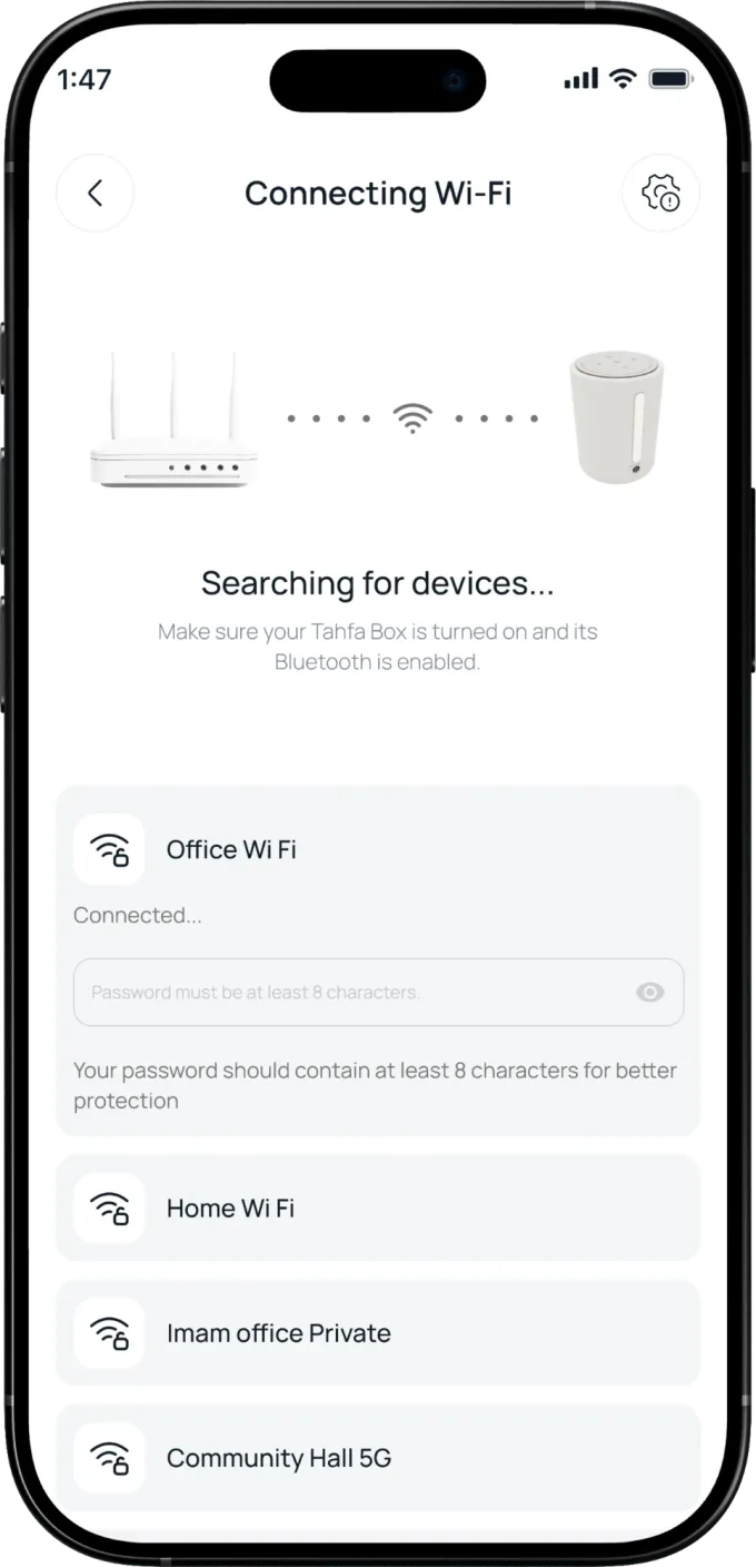 The Wi-Fi screen: a router linked to a Tahfa Box, and a list of networks to choose from.
